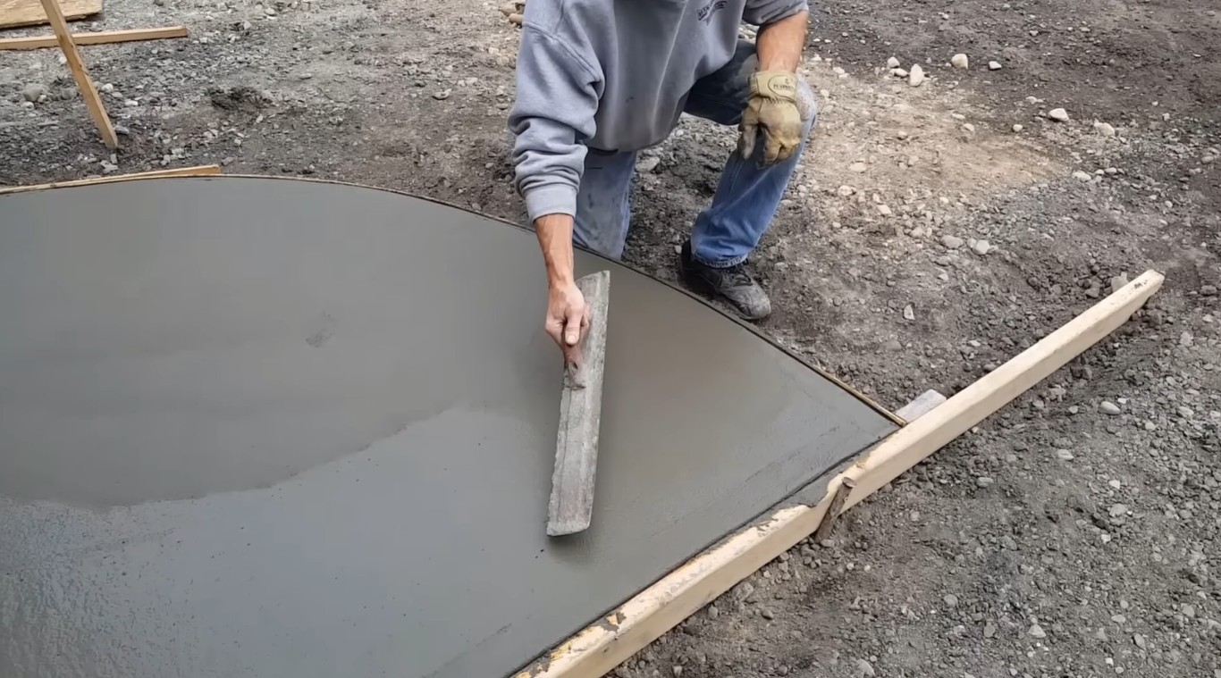 Expert concrete finishing technique for smooth, durable surfaces